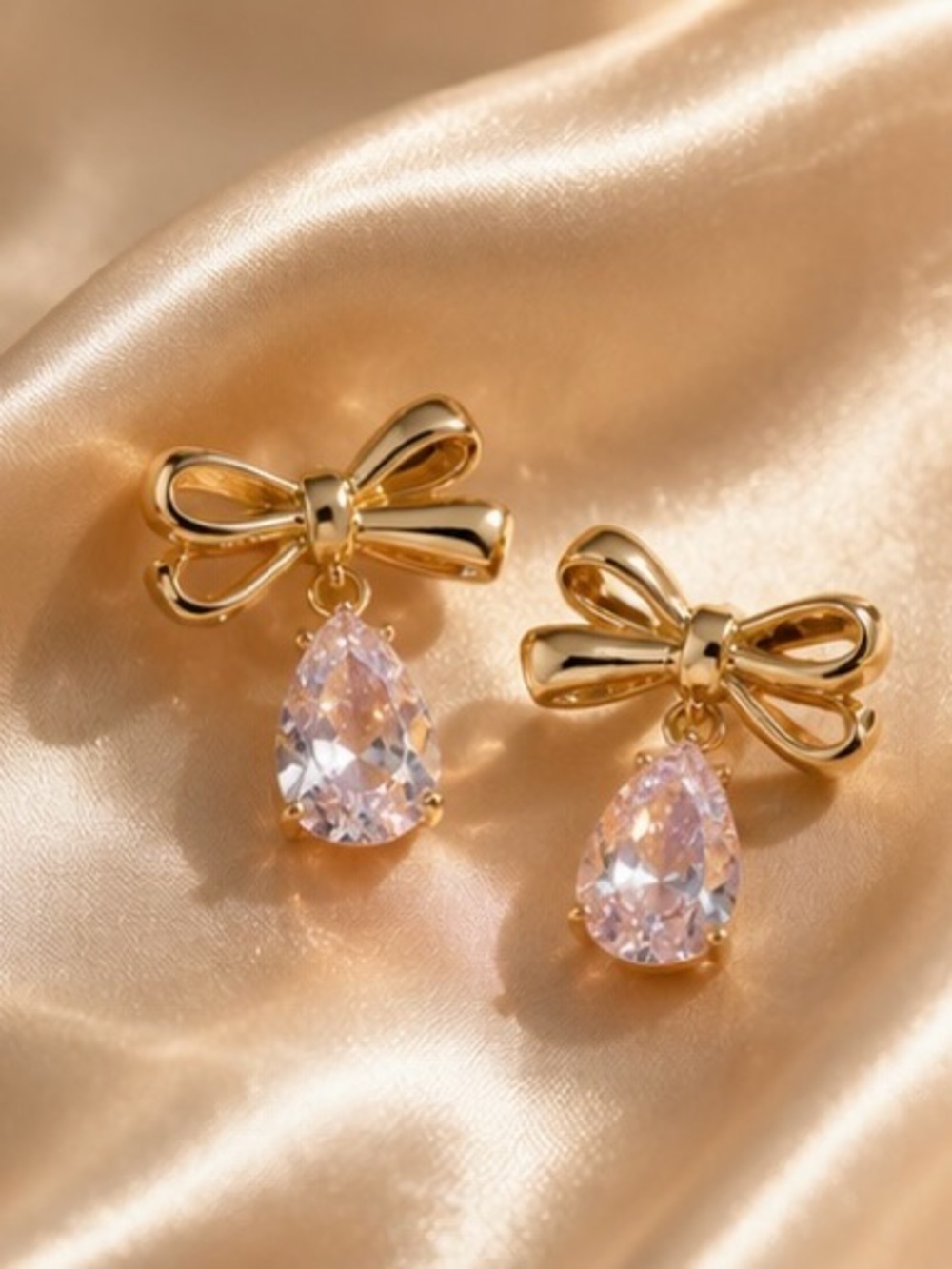 Gold Bow Earrings with Pale Pink Teardrop Crystals